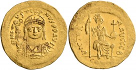 Justin II, 565-578. Solidus (Gold, 20 mm, 4.48 g, 7 h), Constantinopolis. D N IVSTINVS P P AVI Helmeted and cuirassed bust of Justin II facing, holdin...