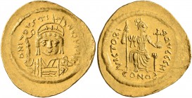 Justin II, 565-578. Solidus (Gold, 23 mm, 4.42 g, 6 h), Constantinopolis. D N IVSTINVS P P AVI Helmeted and cuirassed bust of Justin II facing, holdin...