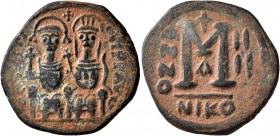 Justin II, with Sophia, 565-578. Follis (Bronze, 26 mm, 9.53 g, 6 h), Nicomedia, RY 4 = 568/9. D N IVSTINVS P P AVG Justin II, holding globus cruciger...