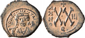 Maurice Tiberius, 582-602. Half Follis (Bronze, 23 mm, 5.87 g, 6 h), Theoupolis (Antiochia), RY 3 = 584/5. Crowned facing bust of Maurice Tiberius, we...