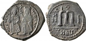 Phocas, 602-610. Follis (Bronze, 30 mm, 10.32 g, 5 h), with Leontia, Theoupolis (Antiochia), RY 1 = 602/603. O N FOCA NЄ PЄ AV Phocas standing facing,...
