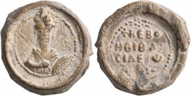 Basileios, 2nd half of 12th century. Seal (Lead, 24 mm, 19.27 g, 12 h). Θ/Θ-E/O/Δ/ωP Nimbate facing bust of Saint Theodore, holding a spear over his r...