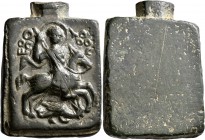 Uncertain, circa 13th-15th centuries. Amulet (Bronze, 39 mm, 47.52 g). Saint George, nimbate, riding on horseback to right, spearing dragon; to upper ...