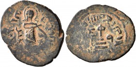 ISLAMIC, Umayyad Caliphate. temp. 'Abd al-Malik ibn Marwan, AH 65-86 / AD 685-705. Fals (Bronze, 21 mm, 2.94 g, 10 h), 'Standing Caliph' type, uncerta...