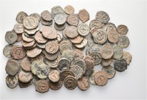 A lot containing 96 bronze coins. All: Byzantine. Fair to about very fine. LOT SOLD AS IS, NO RETURNS. 96 coins in lot.