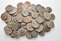 A lot containing 72 bronze coins. All: Arab-Byzantine. Fine to very fine. LOT SOLD AS IS, NO RETURNS. 72 coins in lot.


From a collection of Arab-...