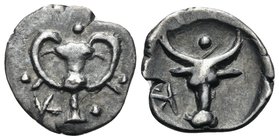 CALABRIA. Tarentum. Circa 380-325 BC. Obol (Silver, 10.5 mm, 0.53 g, 2 h). K Cantharus, with four pellets around. Rev. K (retrograde) Bucranium, with ...