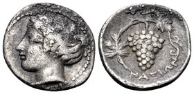 SICILY. Naxos. Circa 415-403 BC. Litra (Silver, 12 mm, 0.77 g, 6 h). Head of youthful Dionysos to left, wearing ivy wreath. Rev. ΝΑΧΙΩΝ Vine branch wi...