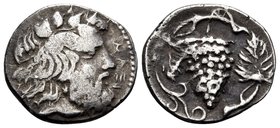 SICILY. Naxos. Circa 415-403 BC. Litra (Silver, 11 mm, 0.85 g, 6 h). NAΞI Head of bearded Dionysos to right, wearing ivy wreath. Rev. Bunch of grapes ...
