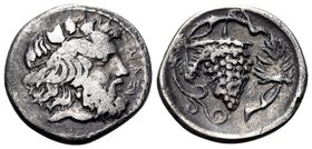 SICILY. Naxos. Circa 415-403 BC. Litra (Silver, 12 mm, 1.01 g, 9 h). NAΞI Head of bearded Dionysos to right, wearing ivy wreath. Rev. Bunch of grapes ...