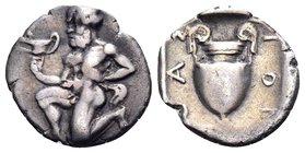 ISLANDS OFF THRACE, Thasos. Circa 411-340 BC. Trihemiobol (Silver, 11 mm, 0.64 g, 2 h). Bald satyr kneeling to left, holding kantharos in his right ha...