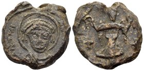 Justinian I, 527-565. Seal (Lead, 19 mm, 5.61 g, 12 h). [..]IVSTINI - AN[..] Nimbate, helmeted, and cuirassed facing bust of Justinian. Rev. Angel sta...