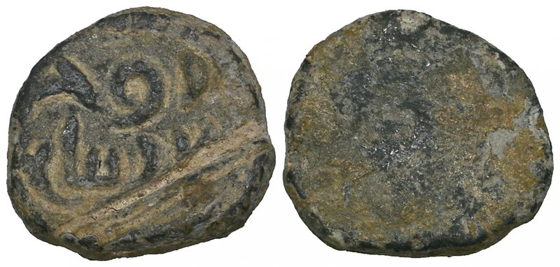 Umayyad, lead seal or weight, uniface, with the name of Rawh | ibn Zinba‘ in two...