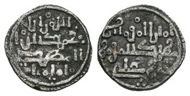 Taifas Almoades. Abd Al Mumin ben Ali. Quirate. 524-558 H. Sin ceca. (Vives-2043 variante). (Hz-1062 variante). Ag. 0,71 g. Moneda de tipo almorávide ...