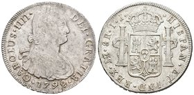 Carlos IV (1788-1808). 8 reales. 1792. Lima. IJ. (Cal-646). Ag. 26,94 g. Restos brillo original. EBC-/EBC. Est...300,00.