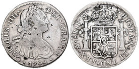 Carlos IV (1788-1808). 8 reales. 1798. México. FM. (Cal-692). Ag. 26,55 g. Pequeños resellos orientales. BC+. Est...70,00.