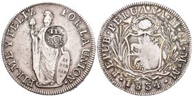 Isabel II (1833-1868). 8 reales. 1834. Lima. MM. (Cal-451). Ag. 28,04 g. Resello YII bajo corona para circular por Filipinas. MBC+. Est...120,00.