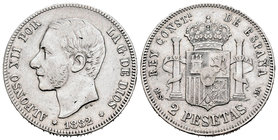 Alfonso XII (1874-1885). 2 pesetas. 1882*1_-82. Madrid. MSM. (Cal-51). Ag. 9,88 g. MBC-. Est...40,00.