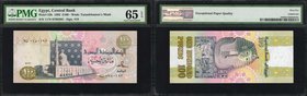 EGYPT. Central Bank of Egypt. 100 Pounds, 1992. P-53b. PMG Gem Uncirculated 65 EPQ.
A watermark of Tutankhamen's death mask is seen on the left end o...