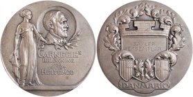 DENMARK. Carnegie Heroism Silver Medal, ND (ca. 1930's). Uncirculated.
By Andreas Hansen. Struck to reward heroism. Woman standing left holding branc...