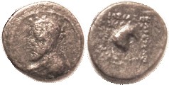 Phraates III, 39.21, Æ14 Dichalkon, Rev horse head rt; F or so, lt brown, minimally grainy, much of rev lgnd clear. Rare! No sale record found.