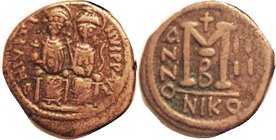 JUSTIN II , Follis, S369, NIKO-IIII-B ; Choice VF, nrly centered, warm brown patina, full clear lgnd, unusually strong detail on figures. (A GVF, same...