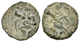 Ebusus. 1/4 de calco. 200-100 a.C. Ibiza. (Acip-733 variante). (Abh-940). Anv.: Bes con martillo y serpiente, a la izquierda cuerno de la abundancia. ...