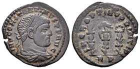 Constantino I. Follis. 312-313 d.C. Roma. (Spink-16128). (Ric-390). Rev.: SPQR OPTIMO PRINCIPI. Águila legionaria entre estandartes militares. Ae. 3,4...