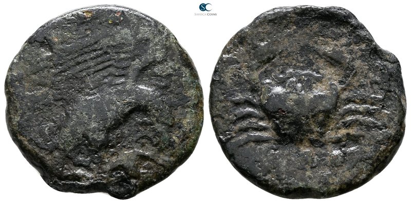 Sicily. Akragas circa 426-406 BC. 
Tetras Æ (?)

19 mm., 4.89 g.



nearl...