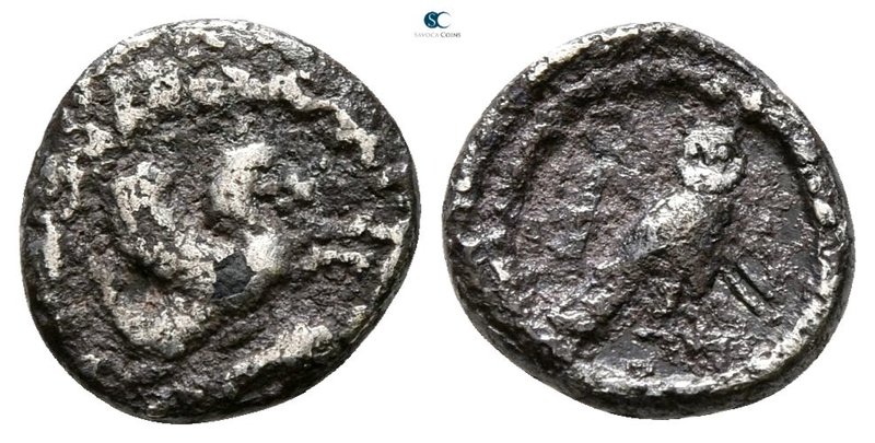 Phoenicia. Tyre circa 425-394 BC. 
1/16 Shekel AR

8 mm., 0.61 g.



near...