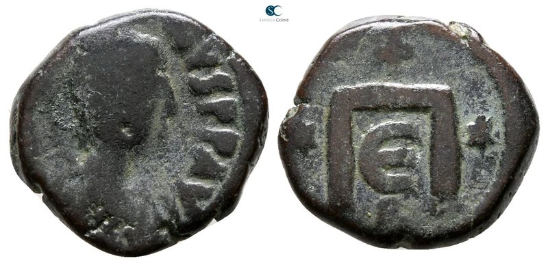 Justin I AD 518-527. Constantinople
Pentanummium Æ

13 mm., 2.77 g.



fi...