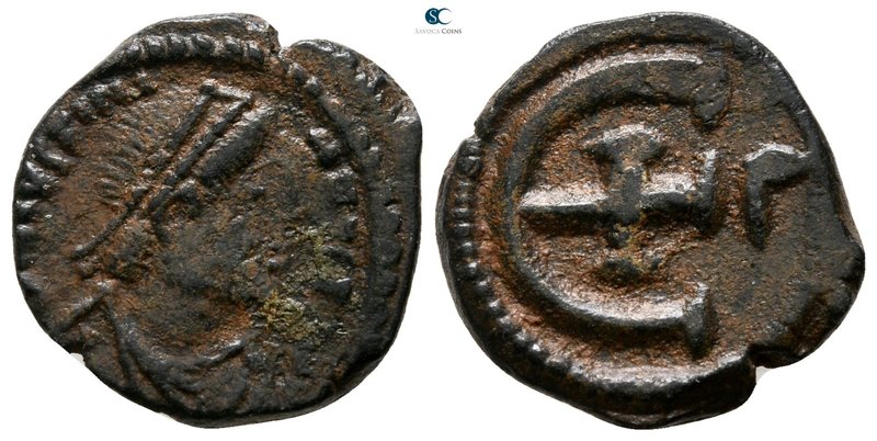 Justinian I AD 527-565. Nikomedia
Pentanummium Æ

15 mm., 2.70 g.



very...