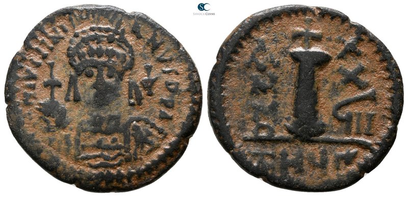 Justinian I AD 527-565. Theoupolis (Antioch)
Decanummium Æ

20 mm., 3.59 g.
...