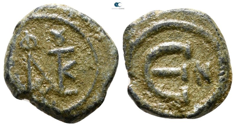 Justin II AD 565-578. Nikomedia
Pentanummium Æ

14 mm., 2.37 g.



very f...