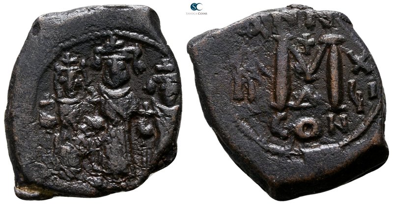 Heraclius & H.Constantine & Martina AD 610-641. Constantinople
Follis Æ

25 m...