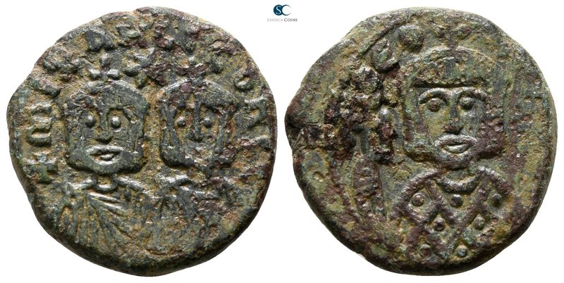 Theophilus with Michael III and Constantine AD 829-842. Syracuse
Follis Æ

18...