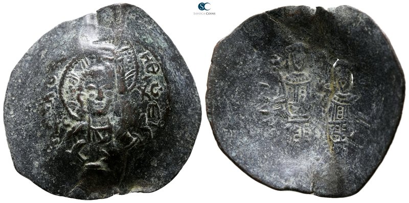 Alexius III Angelus-Comnenus AD 1195-1203. Constantinople
Trachy Æ

28 mm., 3...