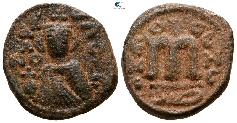 AD 641-668. Imitating Constans II Follis
Fals Æ

20 mm., 4.24 g.



very ...