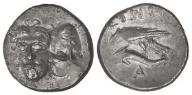 Dracma. 400-350 a.C. ISTROS. TRACIA. Anv.: Dos cabezas imberbes yuxtapuestas e invertidas. Rev.: I¶T¶IH. Águila en pie a izquierda, debajo defín y A. ...