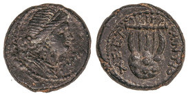 AE 16. 65-66 d.C. SELEUCIS y PIERIA. Anv.: Busto diademado de Artemis a derecha. Rev.: Lira, alrededor leyenda. 3,66 grs. AE. Se-5189. MBC.