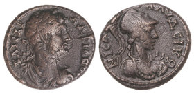 Empire. AE 18. Acuñada el 117-138 d.C. ADRIANO. LICAONIA. Anv.: Cabeza laurada a derecha, alrededor leyenda. Rev.: Busto de Atenea a derecha, alrededo...