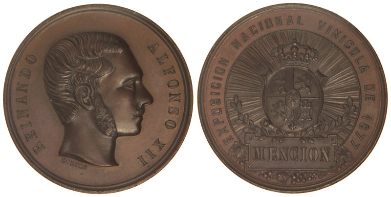 Medalla Exposición Nacional Vinícola. 1877. Anv.: REINANDO ALFONSO XII. Busto a ...
