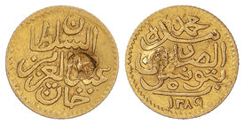 Turkey. 5 Piastras. 1289H. ABDUZ AZIZ con MUHAMMAD AL-SADIQ BEY. TUNIS. 0,89 grs. AU. Contramaarca estrella en anverso. KM-169. MBC.