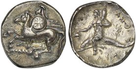 Apulia, Tarentum, Nomos, ca. 280-272 BC
AR (g 6,29; mm 20 ; h 6)
Horseman galloping l., holding shield spear and two spears; on r., IΩ; below, |- | ...