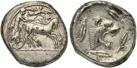 Sicily, Leontini, Tetradrachm, ca. 476-468 BC
AR (g 16,70; mm 27; h 9)
Charioteer driving fast quadriga r., holding kentron and reins; above, Nike f...