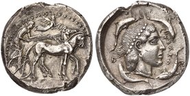 Sicily, Syracuse, Tetradrachm struck under the Second Democracy, ca. 460-450 BC
AR (g 17,32; mm 26; h 12)
Charioteer driving slow quadriga r.; holdi...