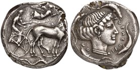 Sicily, Syracuse, Tetradrachm struck under the Second Democracy, ca. 450-440 BC
AR (g 17,24; mm 25; h 5)
Charioteer driving slow quadriga r.; holdin...