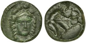 Sicily, Solus, Bronze, 4th century BC
AE (g 2,35; mm 15; h 12)
Helmeted head of Athena facing, slight r., Rv. Warrior knelling r., holding bow and a...