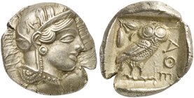 Attica, Athens, Tetradrachm, after 449 BC
AR (g 17,23; mm 27; h 12)
Head of Athena r., wearing crested Attic helmet decorated with three olive leave...