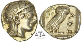 Attica, Athens. AR Tetradrachm, c. 454-404 BC. Helmeted head of Athena right, with frontal eye. Obv: R/ AΘE. Owl standing right, head facing; olive sp...